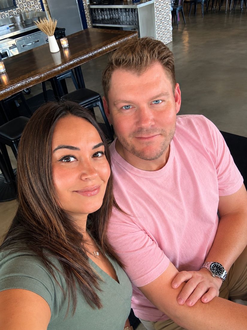 Wendy and Ryan taking a selfie at a restaurant